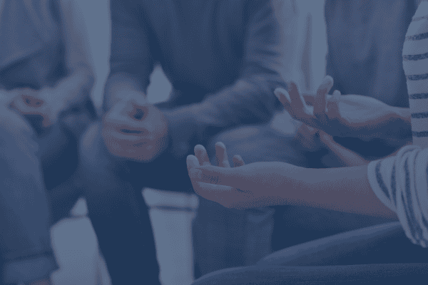 A person reciving mental health therapy and group therapy at Fullarton Clinic