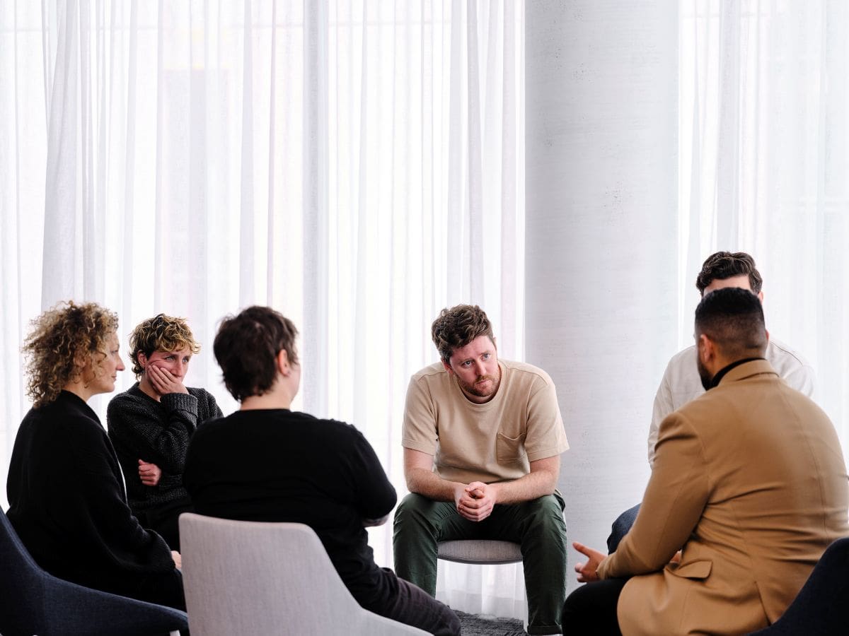 An image of group therapy. Learn more about how to refer patients for inpatient addiction and mental health services including group therapy