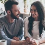 An image of a couple smiling and chatting after successfully completing alcohol rehab in Melbourne