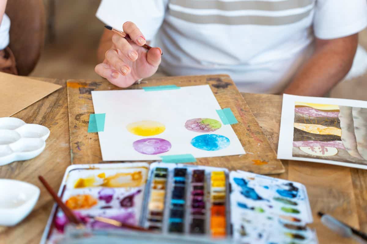 An image of paint and other supplies used in Art Therapy Programs