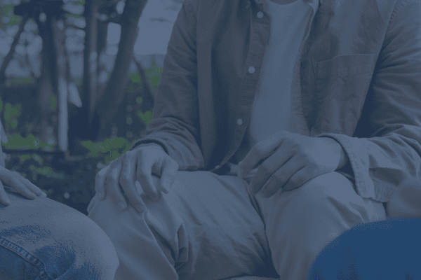 Men talking together as part of a supportive group
