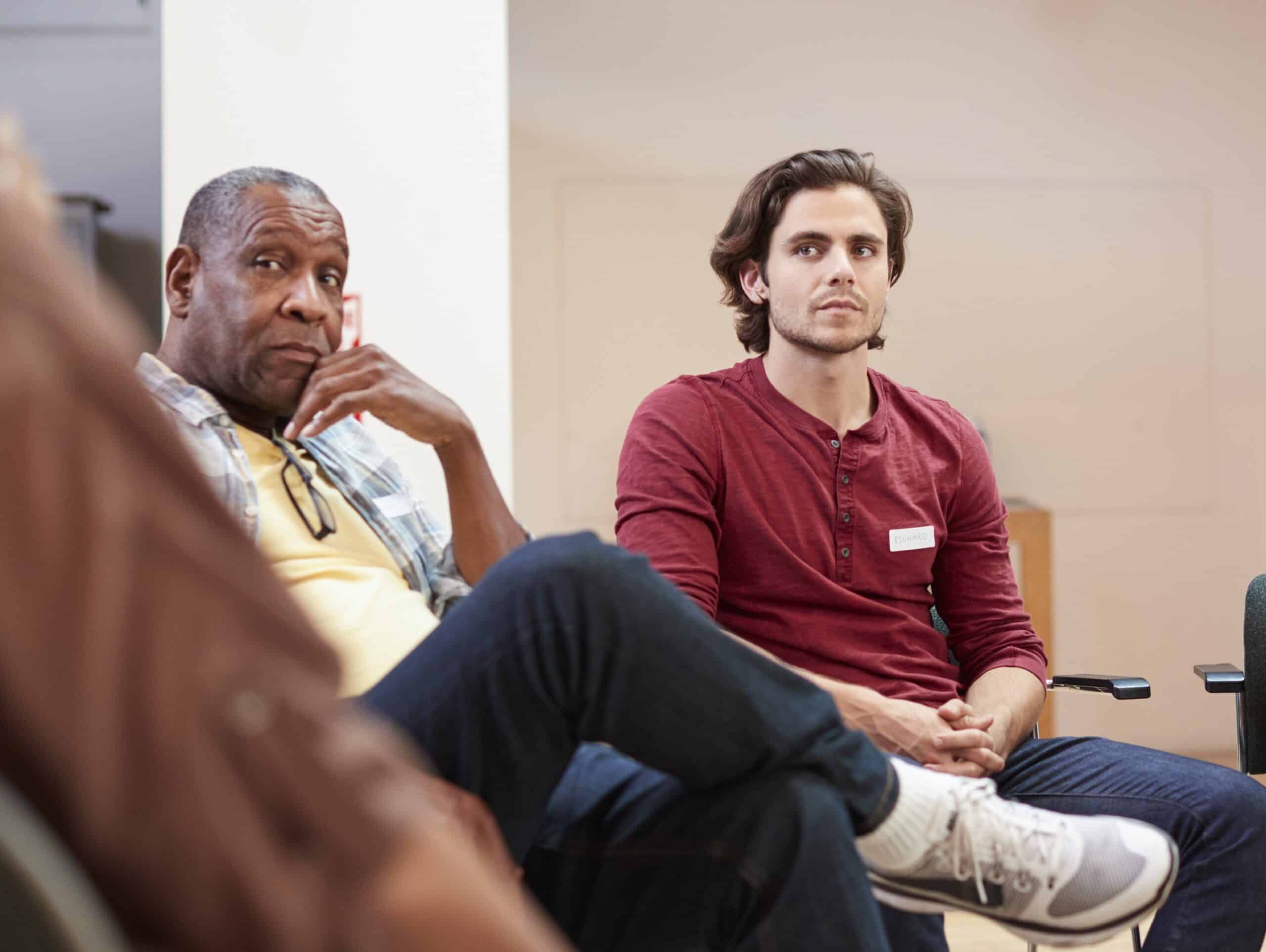 Men taking part in group therapy in Melbourne